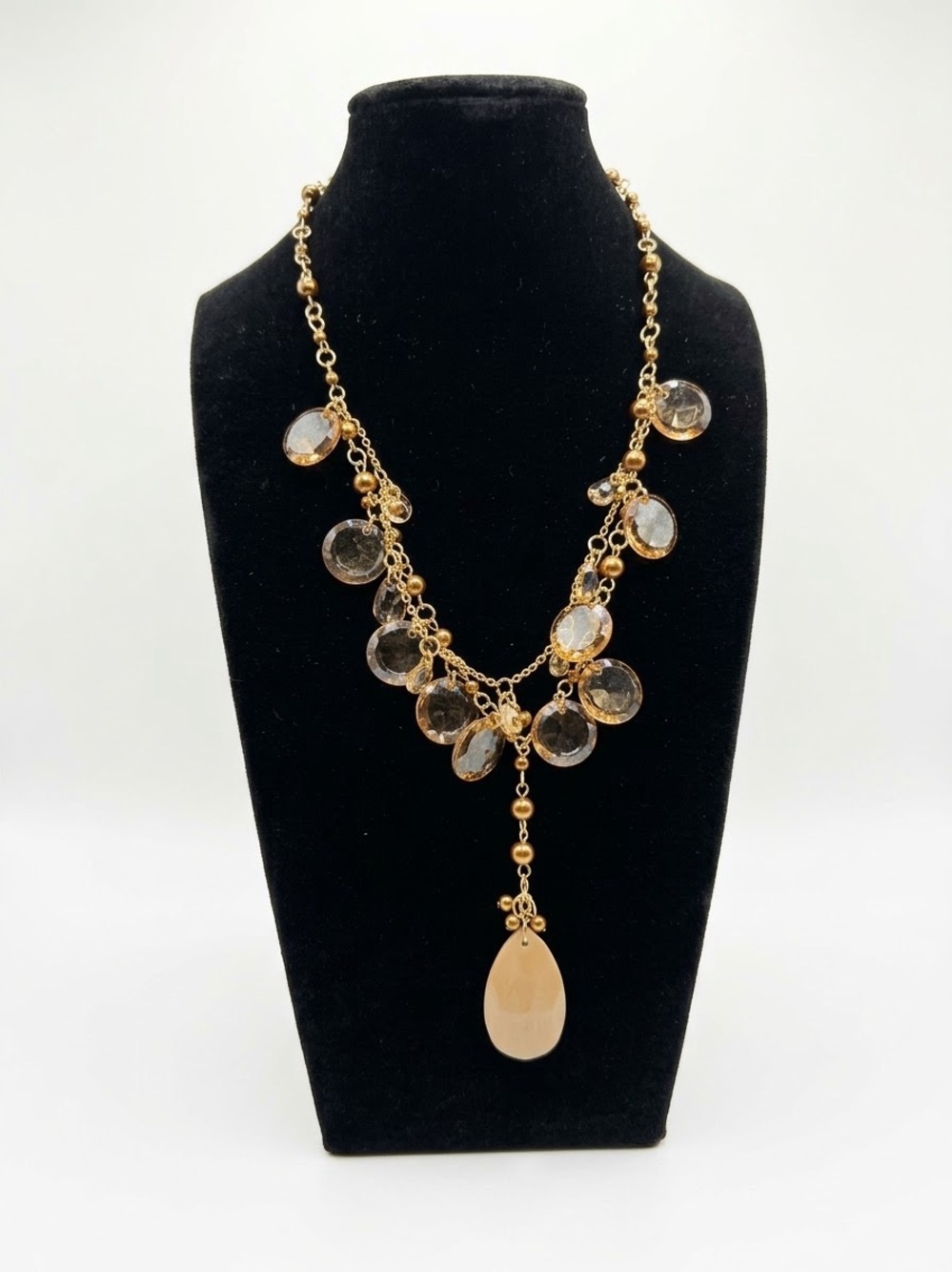 Gold-Tone Teardrop Pendant Necklace with Faceted Discs in velvet pouch
